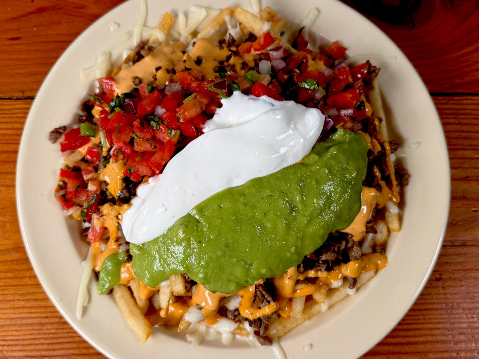 Asada Fries Delicious Creamy Flavorful Dish — authentic Mexican food at Los Periquitos Market and Taqueria Santa Cruz CA